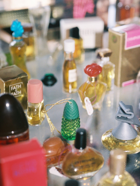 Image may contain Cosmetics Lipstick Bottle and Perfume